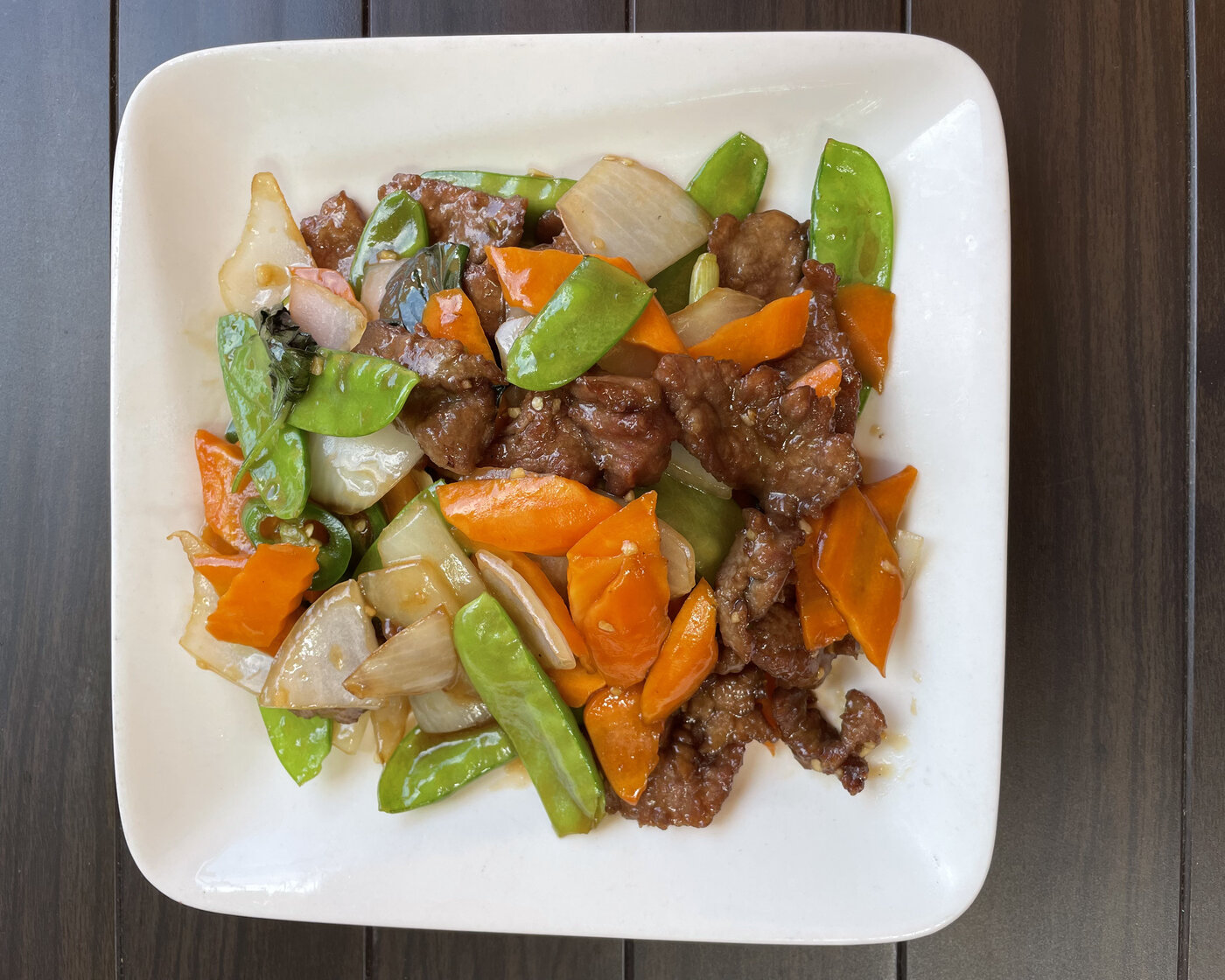 Spicy Basil Beef with snow peas, carrot, and fresh basil